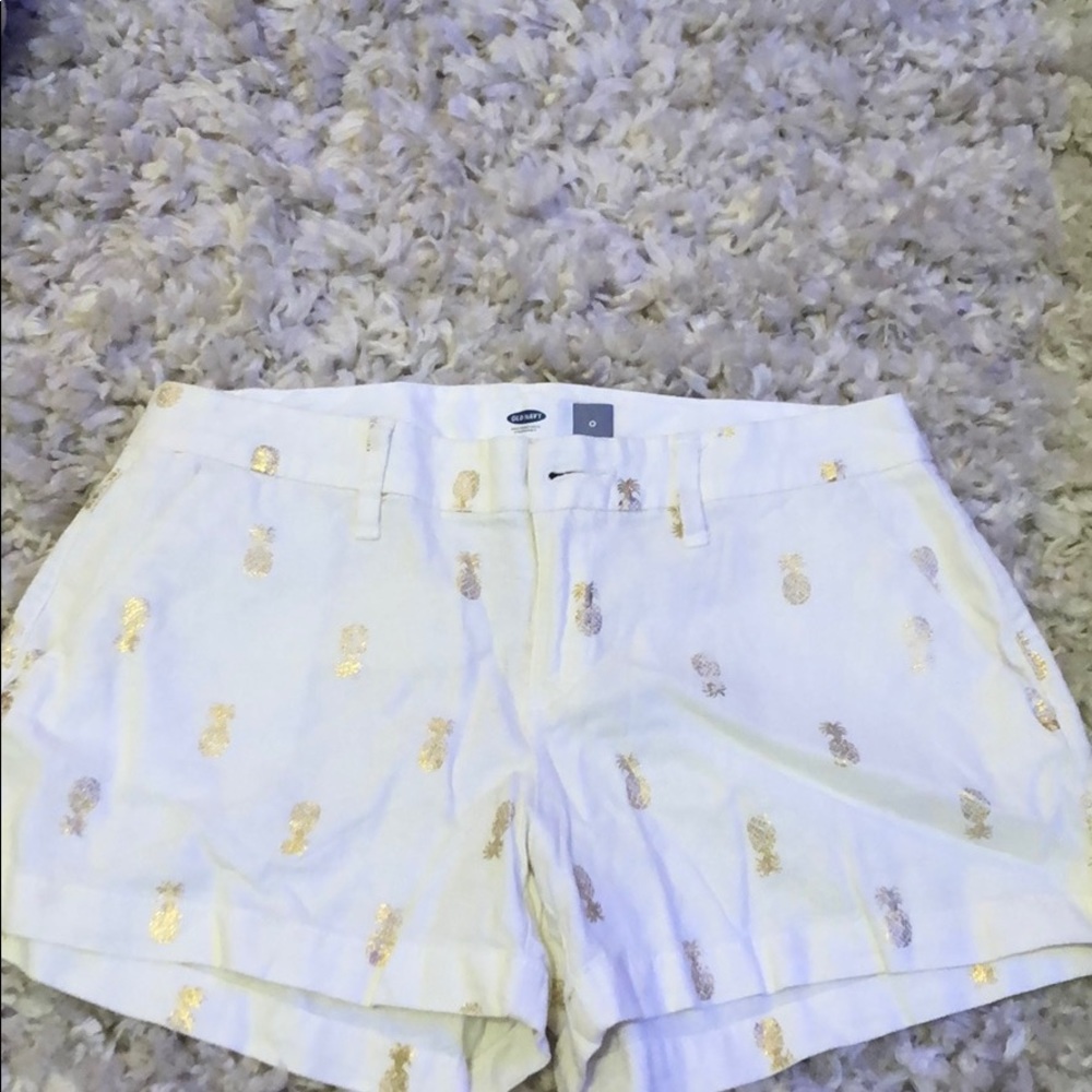 Gorgeous white shorts with gold pineapple design.